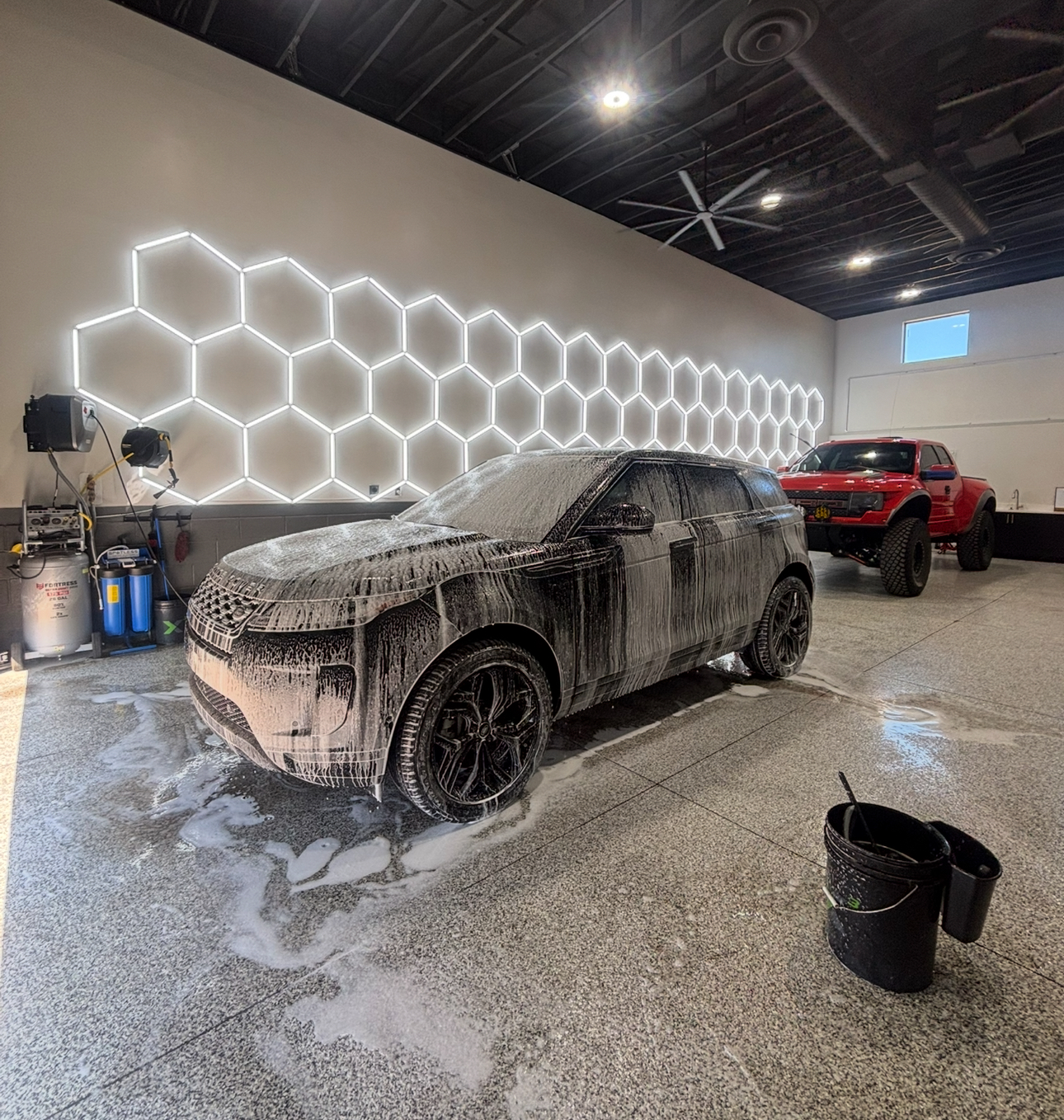 Paint correction polishing process removing swirl marks from vehicle paint
