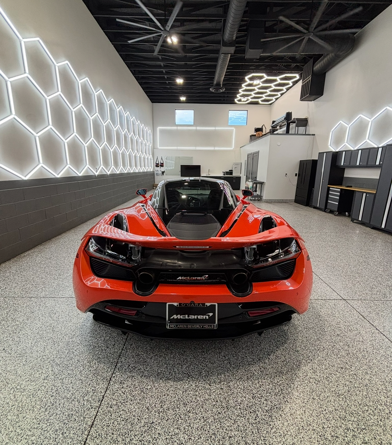 McLaren supercar inside The Auto Spa detailing shop in Hurricane Utah with hexagonal LED lights