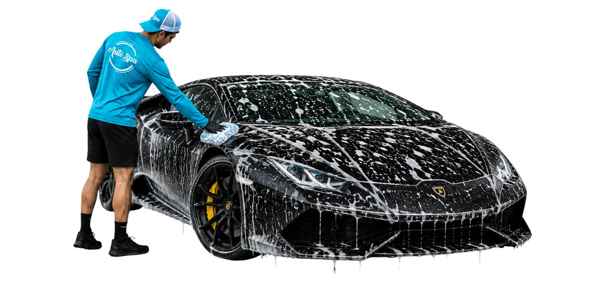 Auto Spa technician washing a Lamborghini Huracan